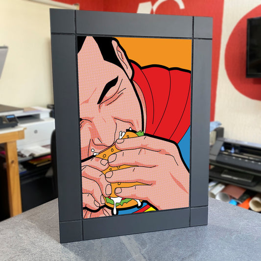 CUADRO DECORATIVO DE MADERA SUPER MAN COMIENDO POP ART